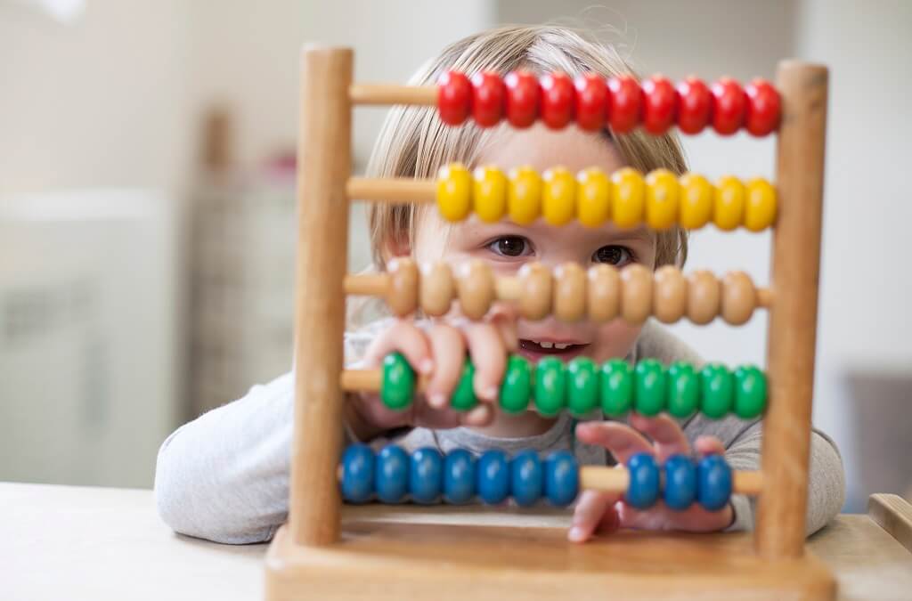 Child using abacus