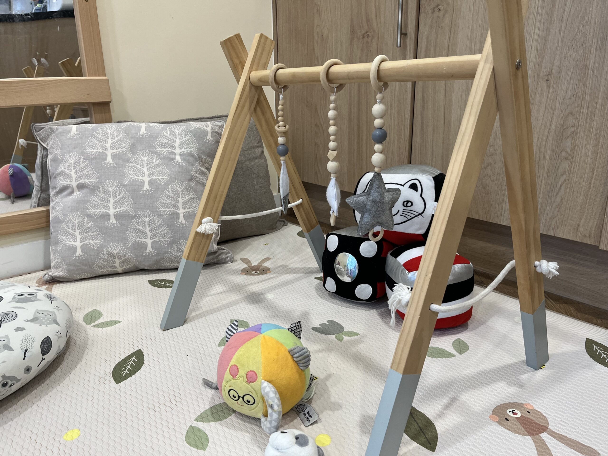 A sensory area for babys to explore textures, colours and sounds