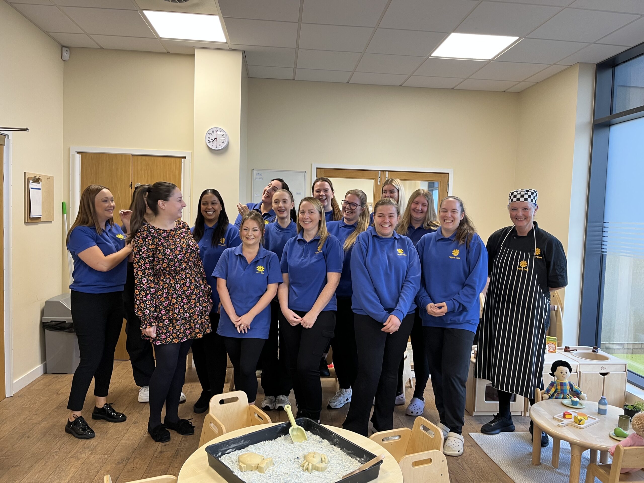 a team photo of all staff members at charlton heights