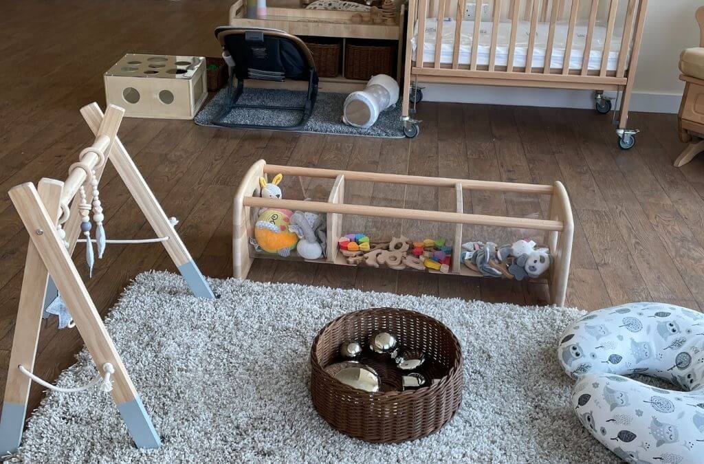 Indoor nursery wooden play area with toys