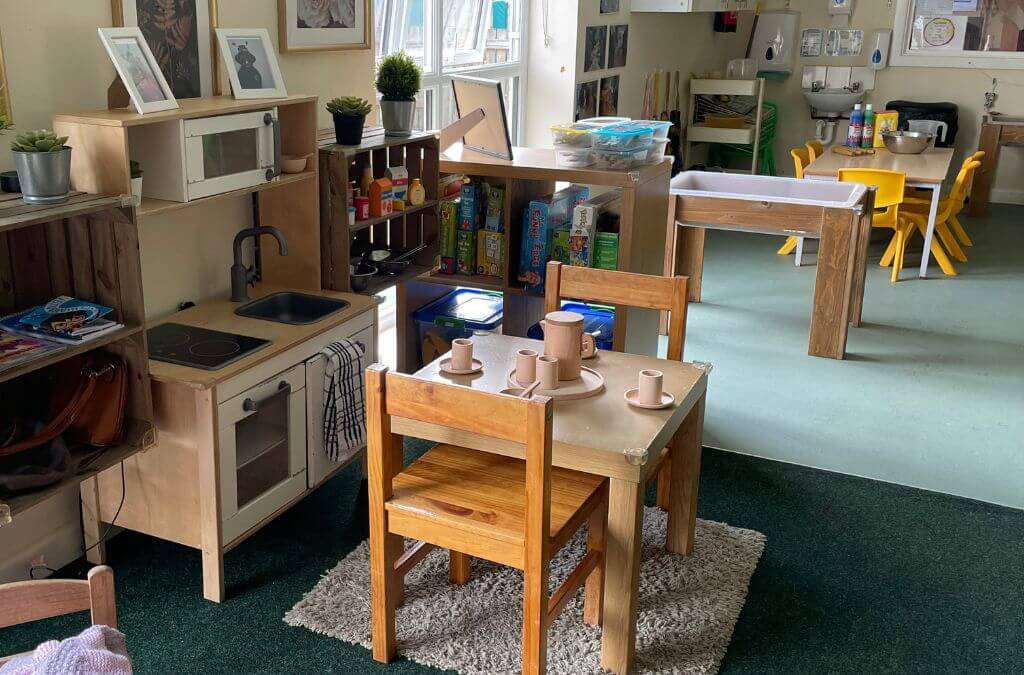 Nursery seating area with tables and chairs