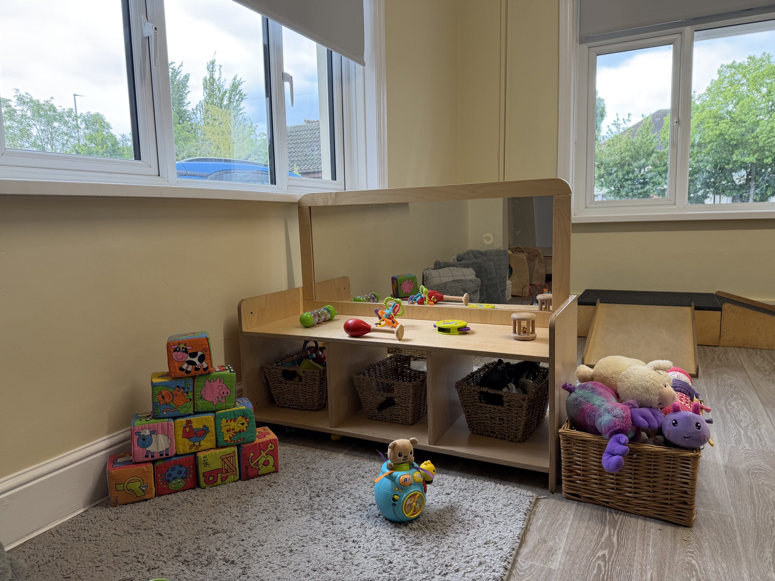 baby room at Portsmouth set up with lots of different age appropriate resources