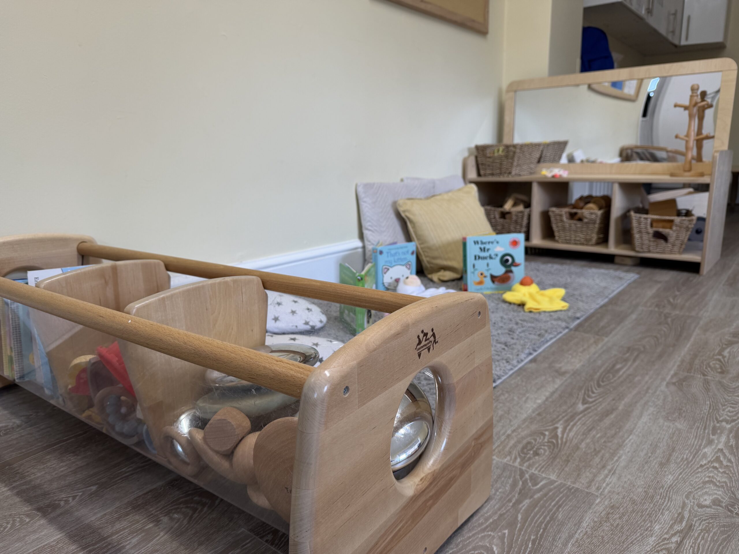 baby room at Portsmouth set up with lots of different age appropriate resources