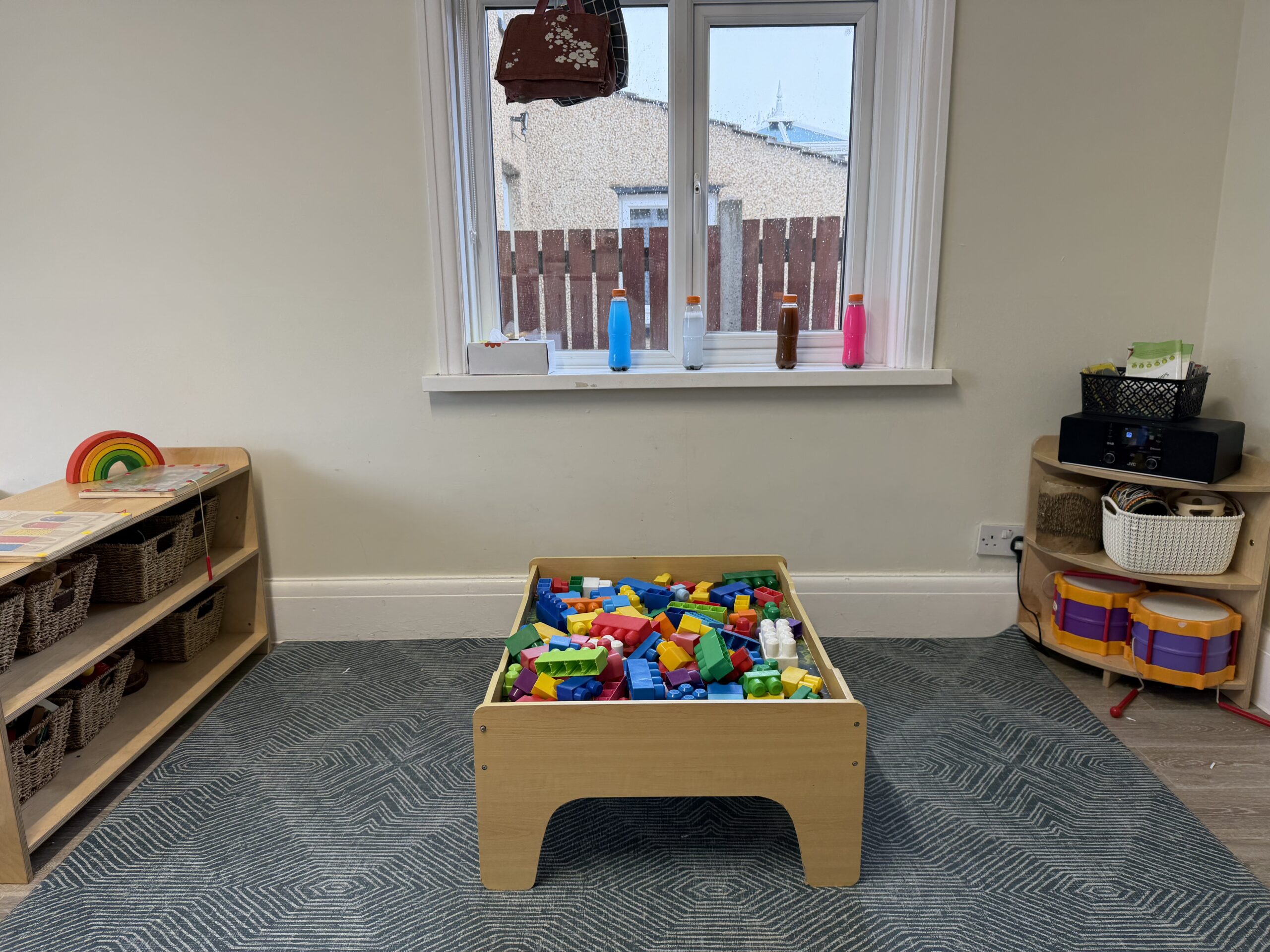 baby room at Portsmouth set up with lots of different age appropriate resources