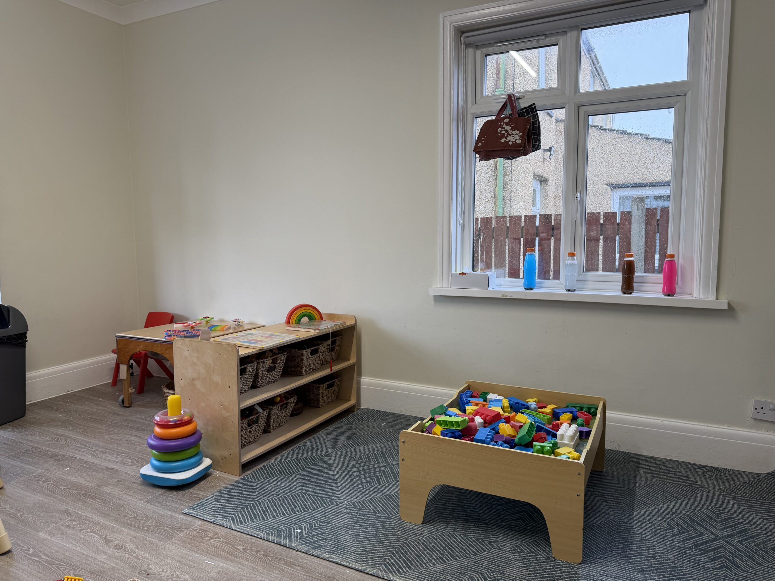 baby room at Portsmouth set up with lots of different age appropriate resources
