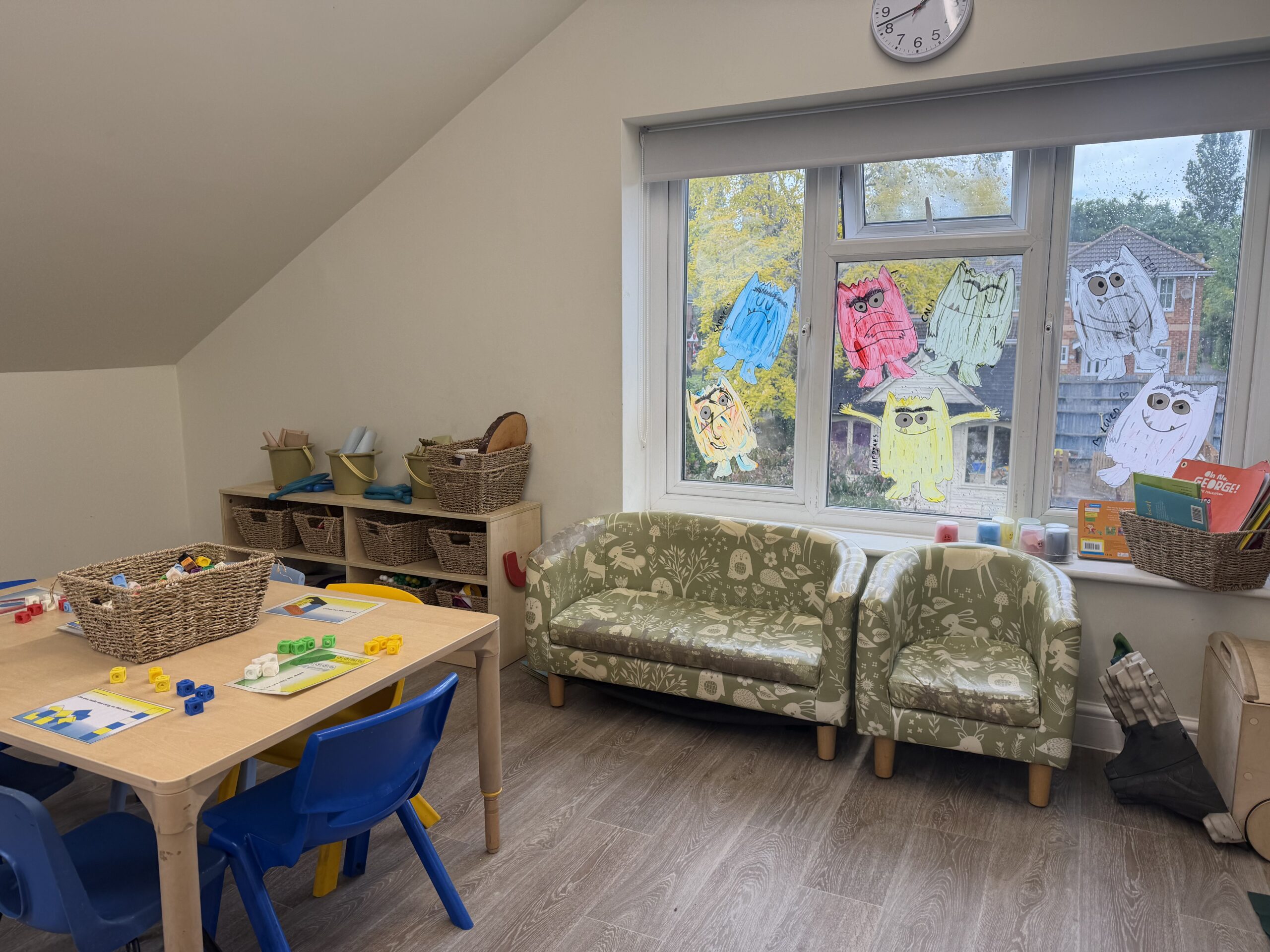 preschool nursery room set up with lots of age appropriate resources
