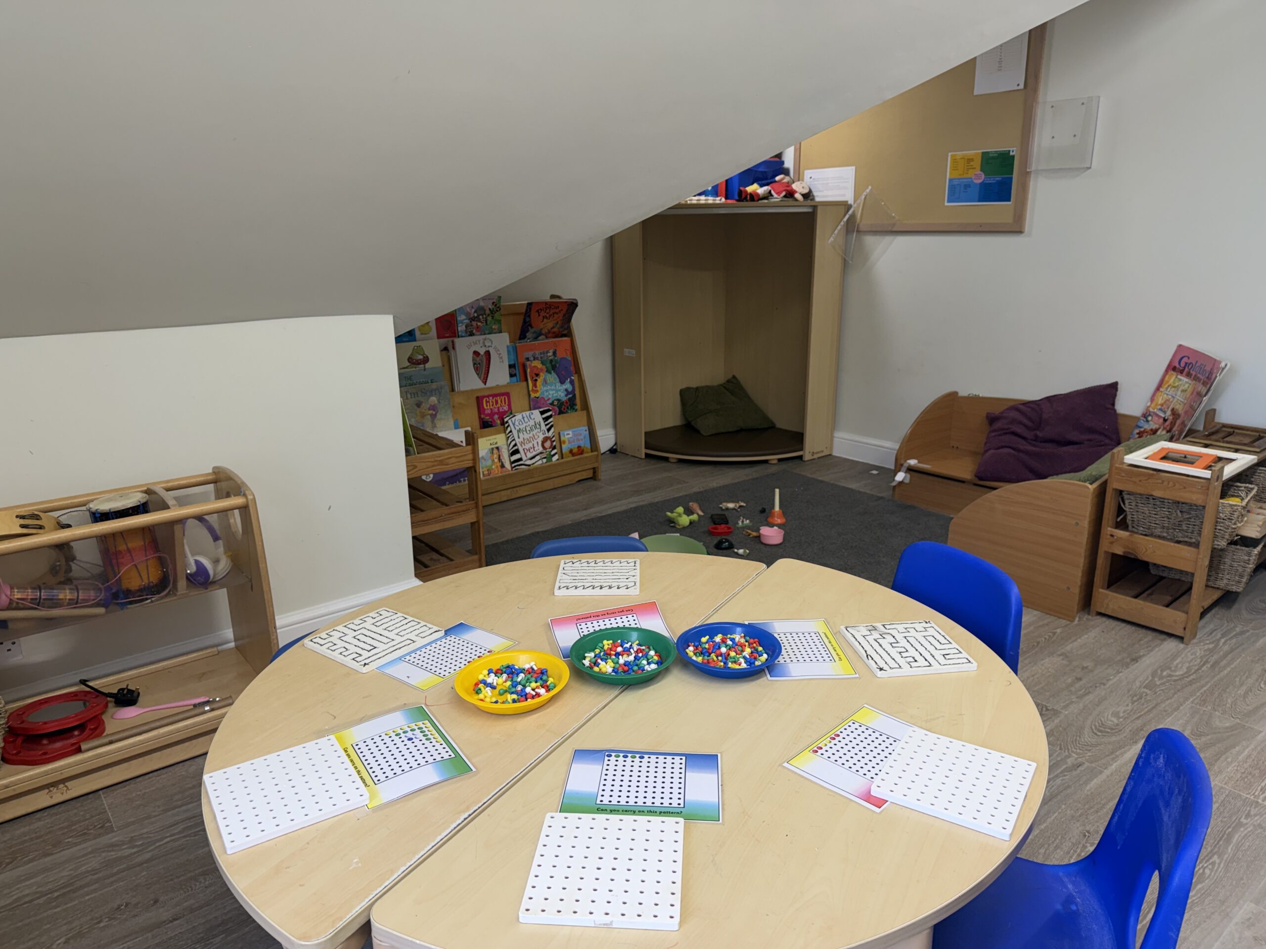 preschool nursery room set up with lots of age appropriate resources
