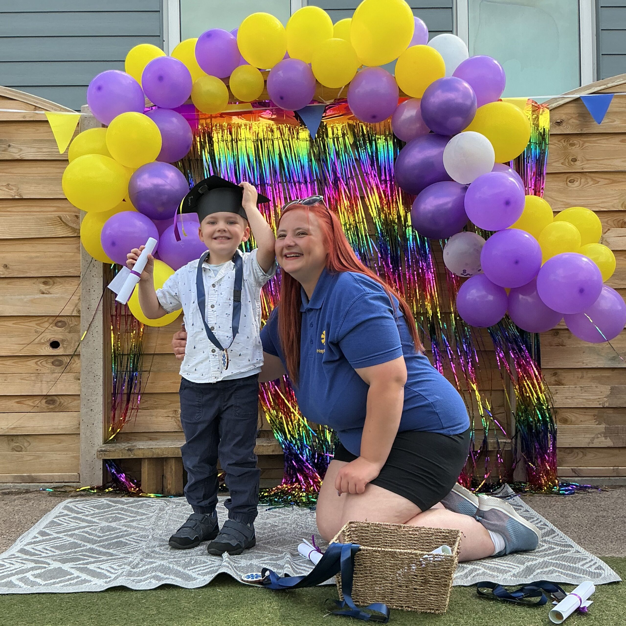Child posing happy after graduating from pre-school