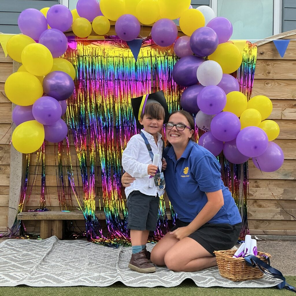 Child posing happy after graduating from pre-school