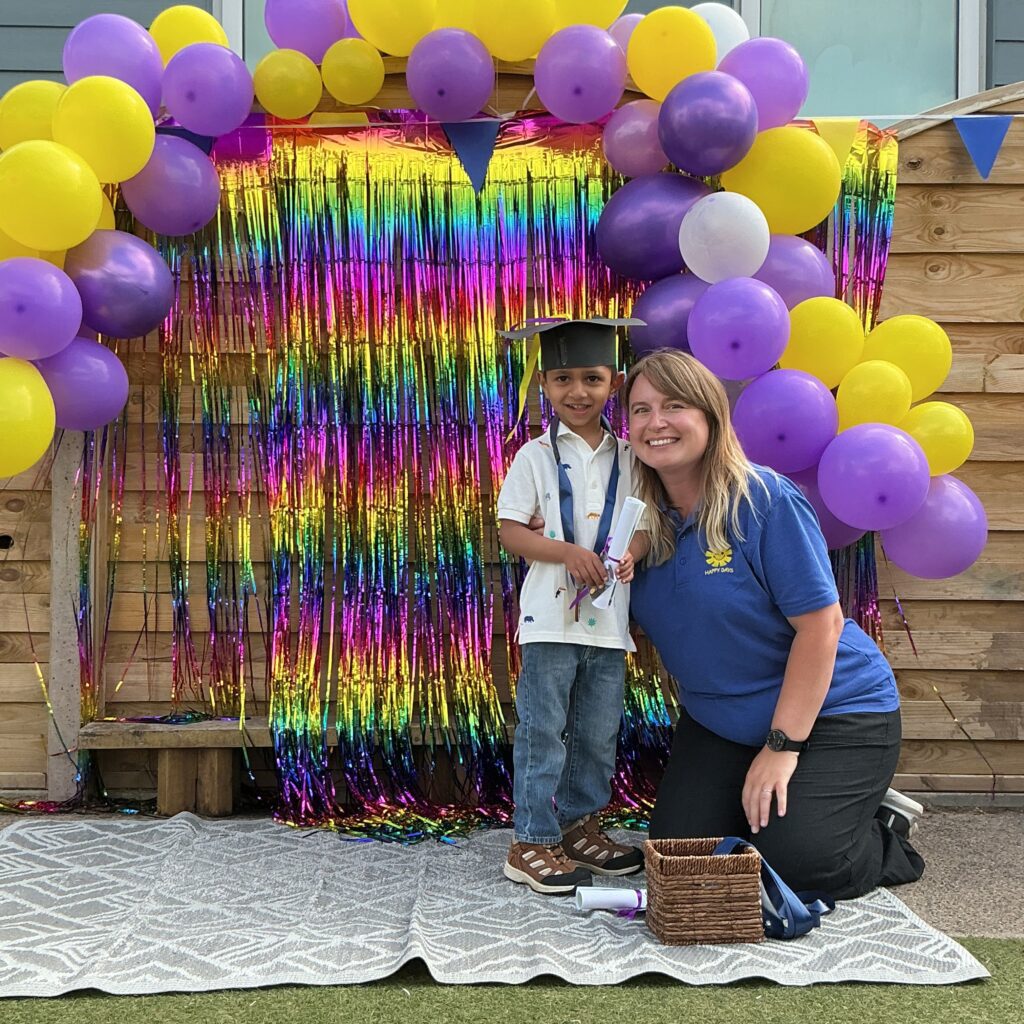 Child posing happy after graduating from pre-school