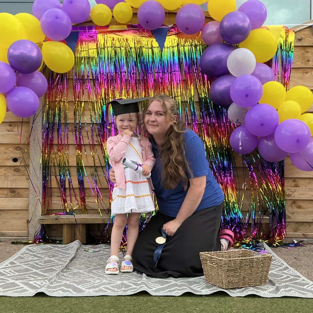 Child posing happy after graduating from pre-school