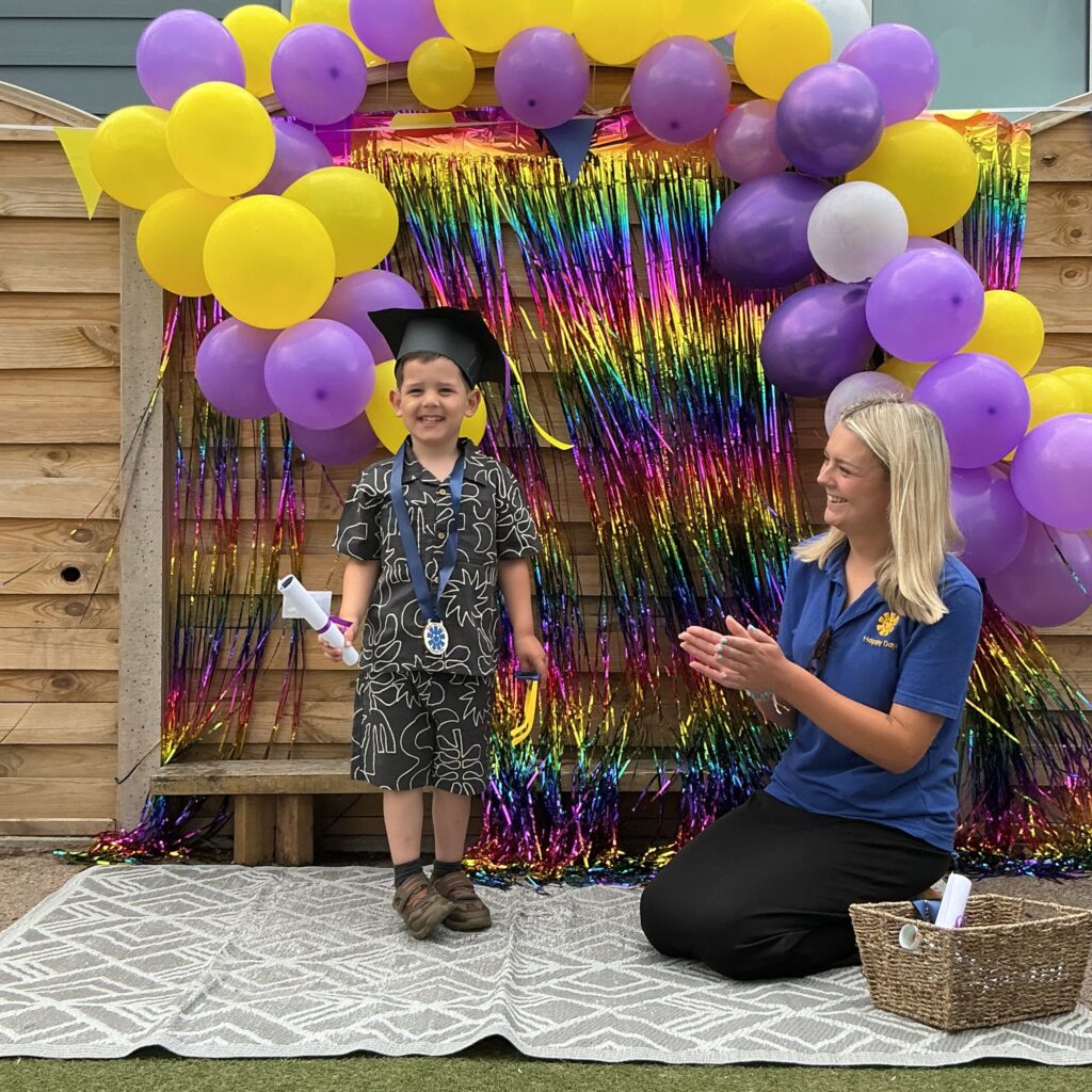 Child posing happy after graduating from pre-school